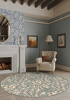Cream round paisley rug for living room.