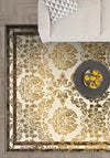 Cream damask rug for a living room.