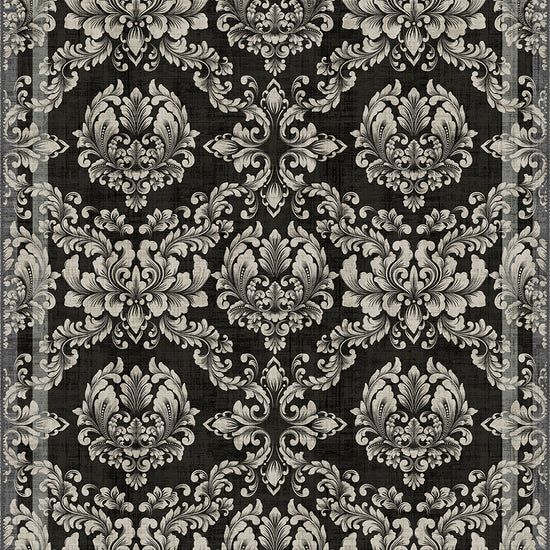 Black gothic rug with damask pattern.