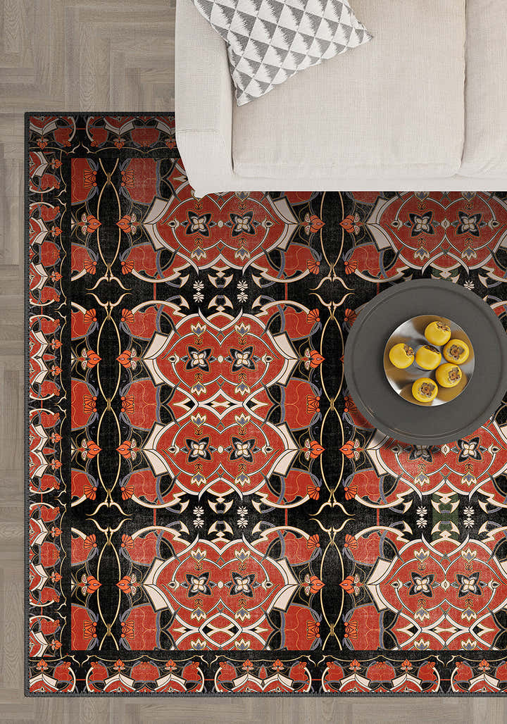 Decorative rug with intricate pattern on a wooden floor