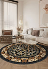 Black round rug with floral motifs.