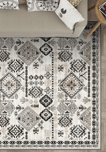 Black and white rug with Anatolian motifs.