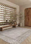 Calyra Bordered Beige Rug