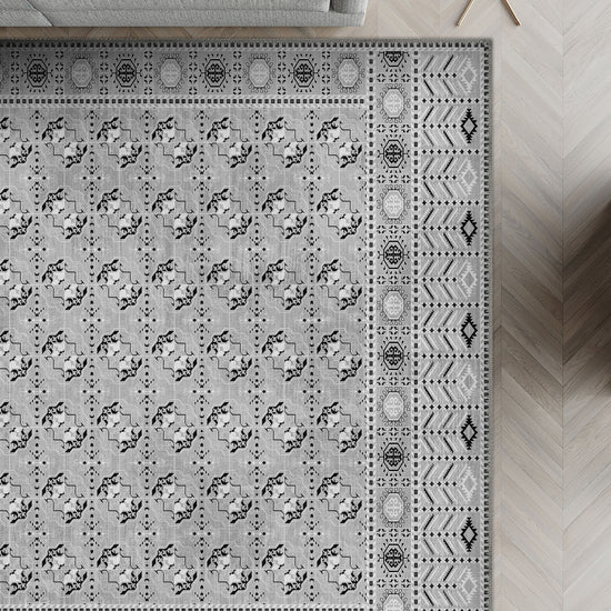 Grey patterned rug for living room.