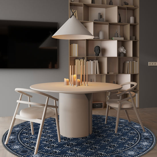 Blue round rug for dining room.