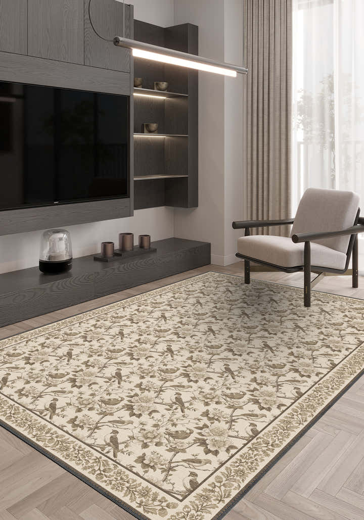 Living room with a patterned rug, TV, and chair.