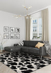cowhide rug with grey sofa