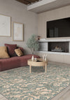 Cream teal paisley rug.