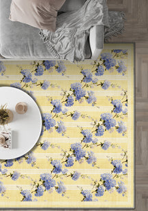 Yellow and lavender floral rug for living room.