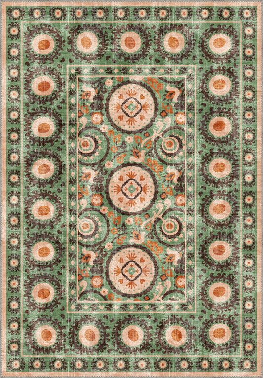 Green suzani rug with ethnic motifs.