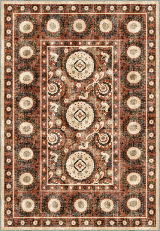 Bohemian terracotta rug with suzani motifs.